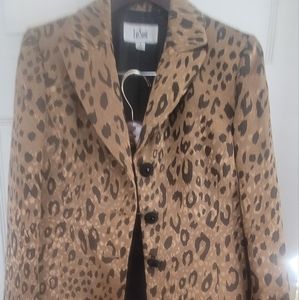 Le Suit- suit with gorgeous animal print jacket & solid colored matching skirt.